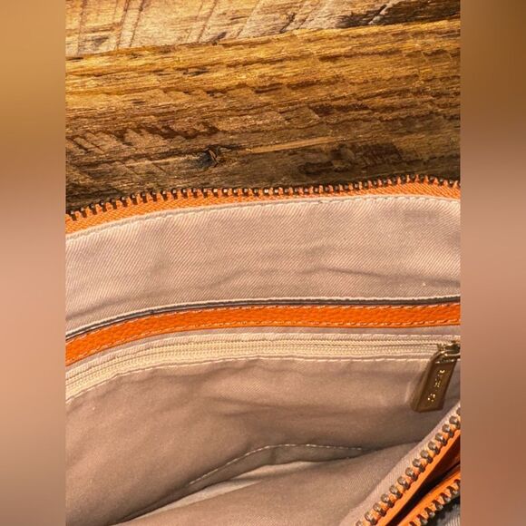 π§‘β Bright Rich Orange Pebbled Leather Crossbody Bag π§‘
Lots of pockets - Picture 10 of 16